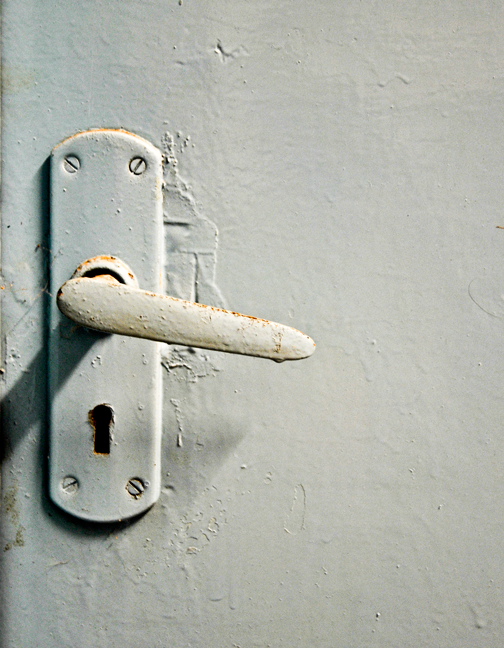 white door handle rusting